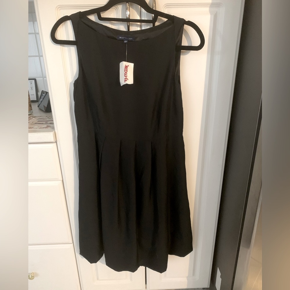 Black 100% silk cocktail dress. Never worn. Size 4